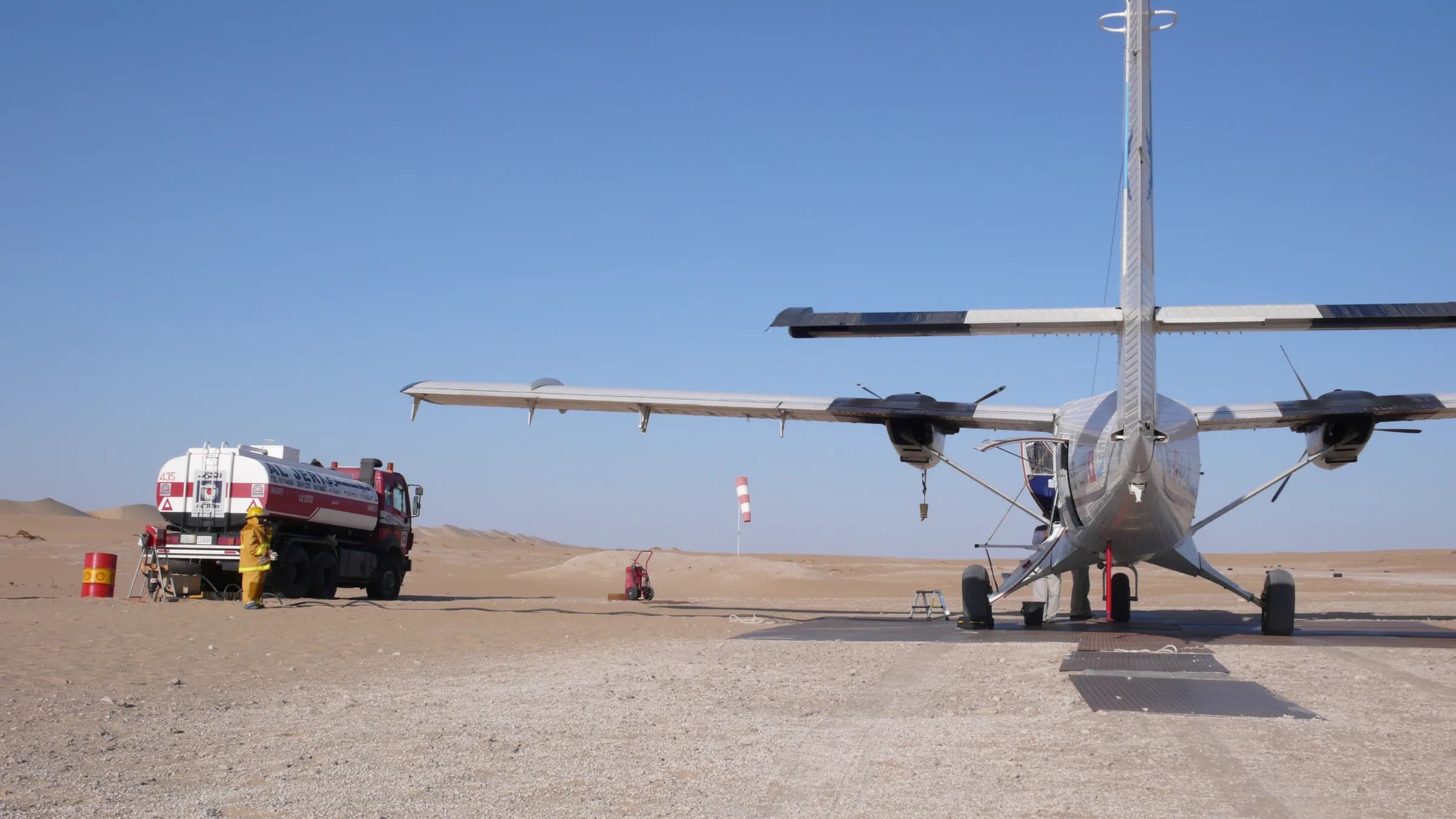 Refuelling a Twin Otter on a desert strip