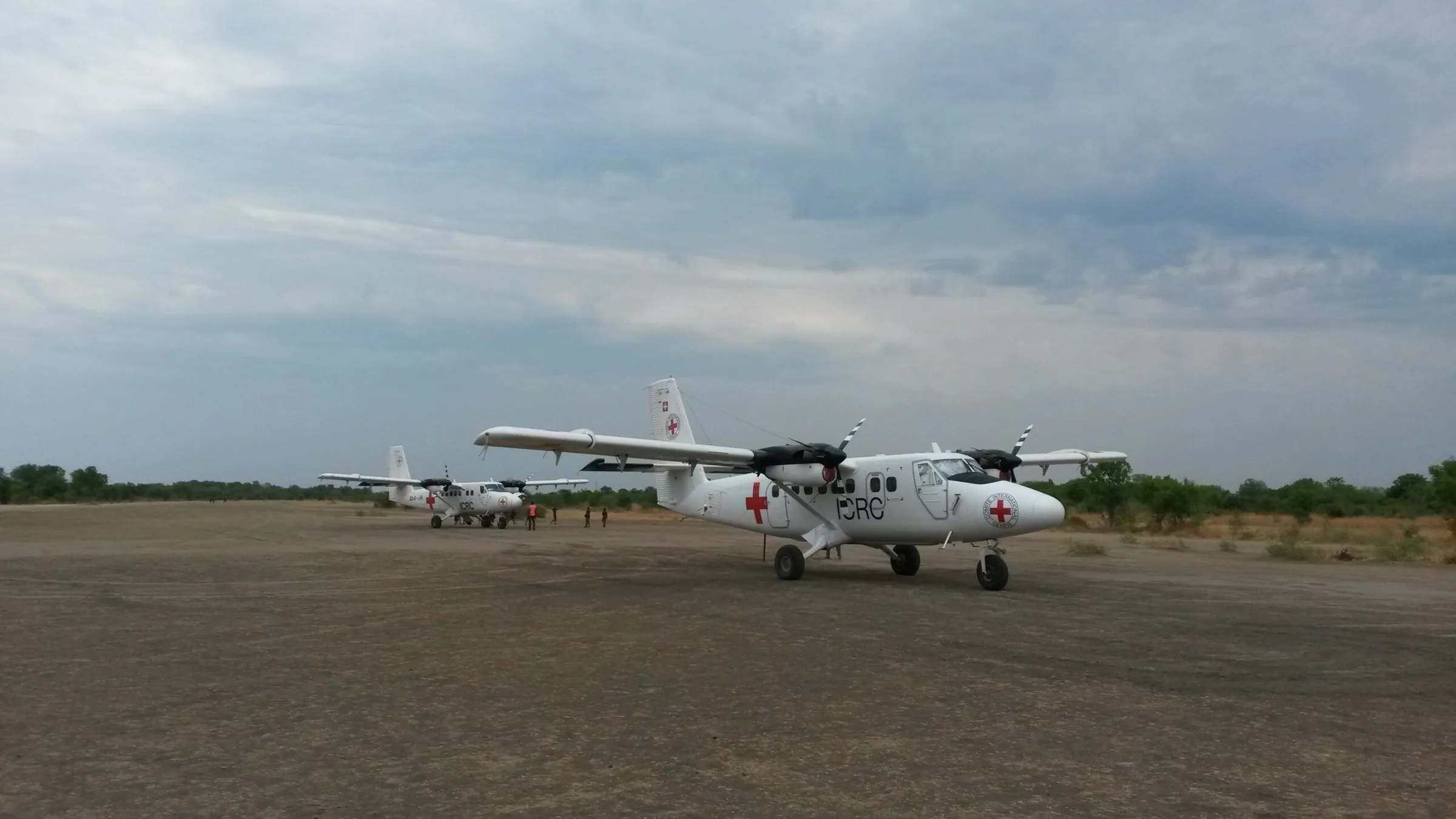Two Twin Otters flying for the ICRC on the airfield at Kajjansi, Uganda.